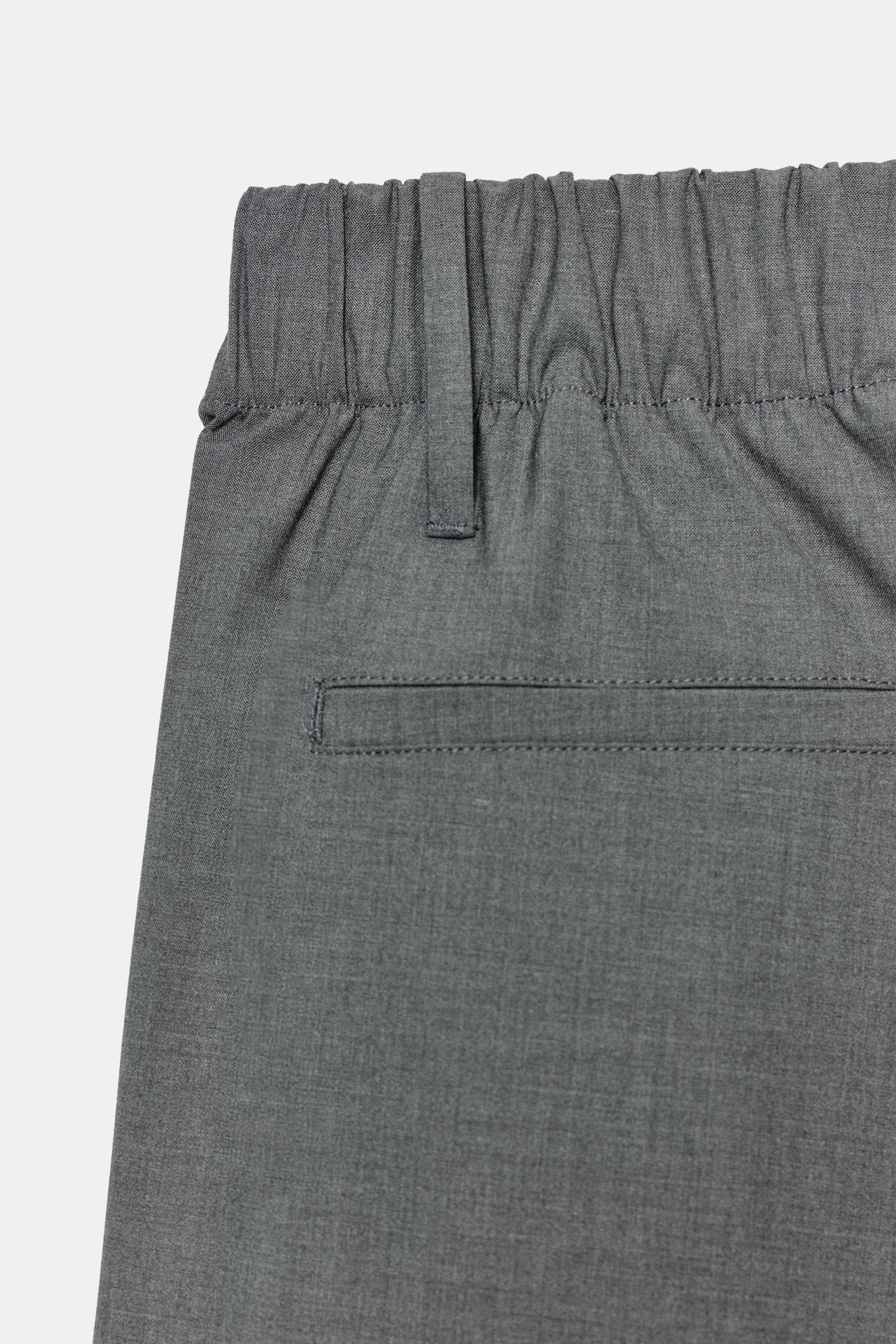 ELASTIC WAIST PLEATED TROUSERS